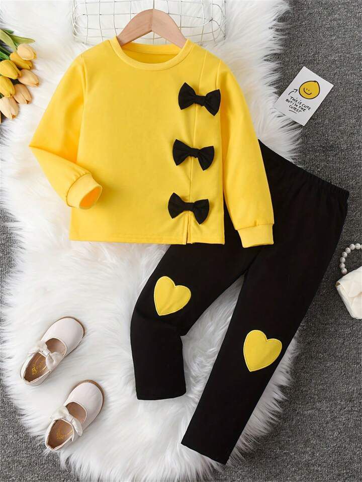 vGlozin Girls Yellow & Black Winter Co-Ord Set with Bow & Heart Patch | Full Sleeve Sweatshirt & Legging Set for Kids (1–14 Years)