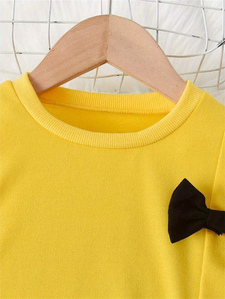 vGlozin Girls Yellow & Black Winter Co-Ord Set with Bow & Heart Patch | Full Sleeve Sweatshirt & Legging Set for Kids (1–14 Years)